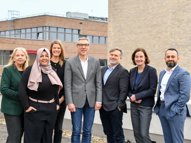 Hochschulrat HRW 7 Personen lächeln in die kamera