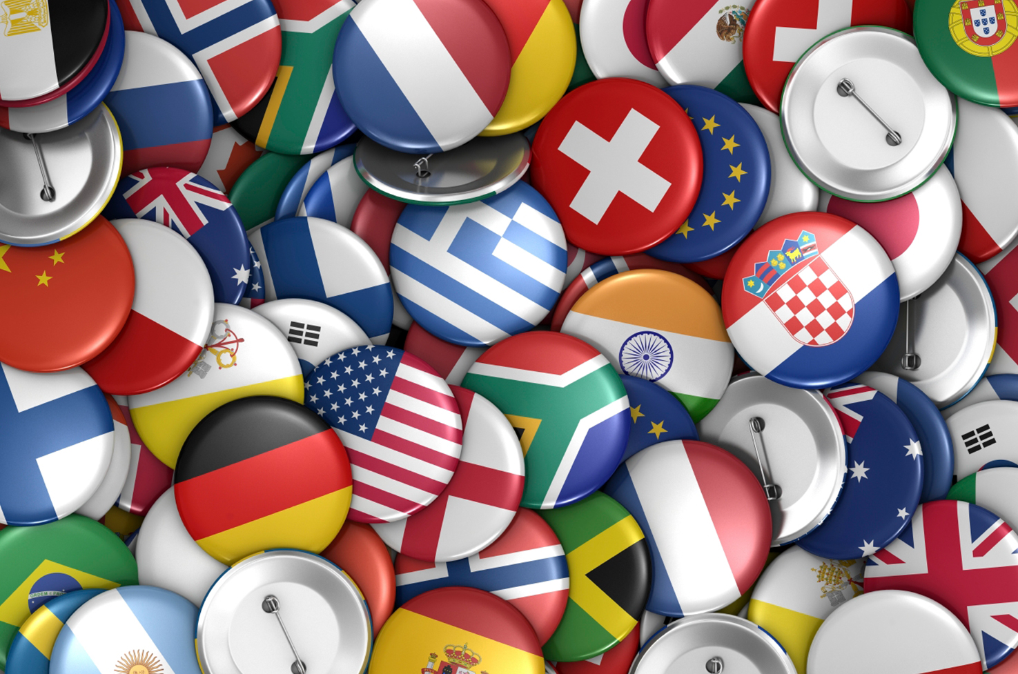 Ansammlung von Buttons mit Flaggenmotiven